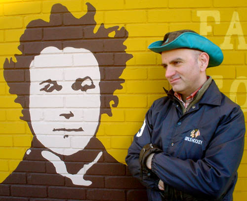 Me with Alexander Muir (R.I.P.) Me in trademark green Gore-Tex® hat and Girls Hockey jacket in front of Alexander Muir mural